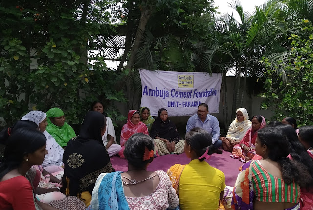 Sukhdeb discussing issues with the women group